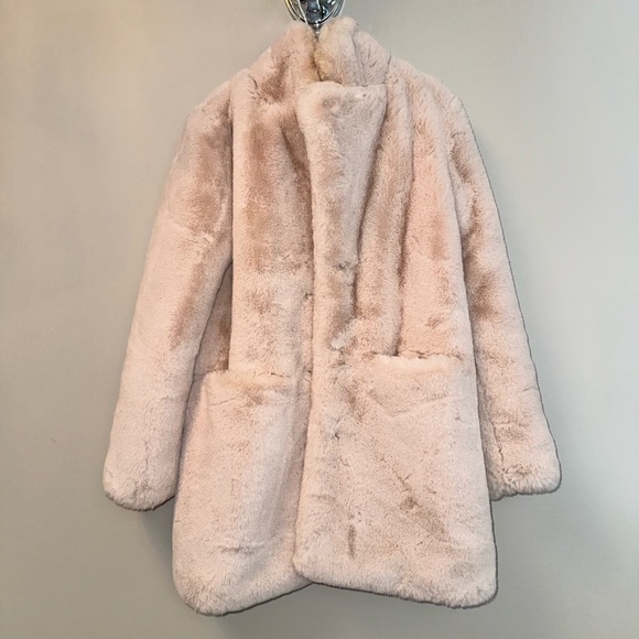 Pale pink faux-fur jacket. Lined. Has pockets. - Picture 1 of 2